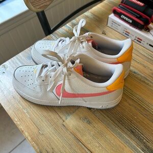 Nike White and Pink Sneakers Classic Low-Top Design